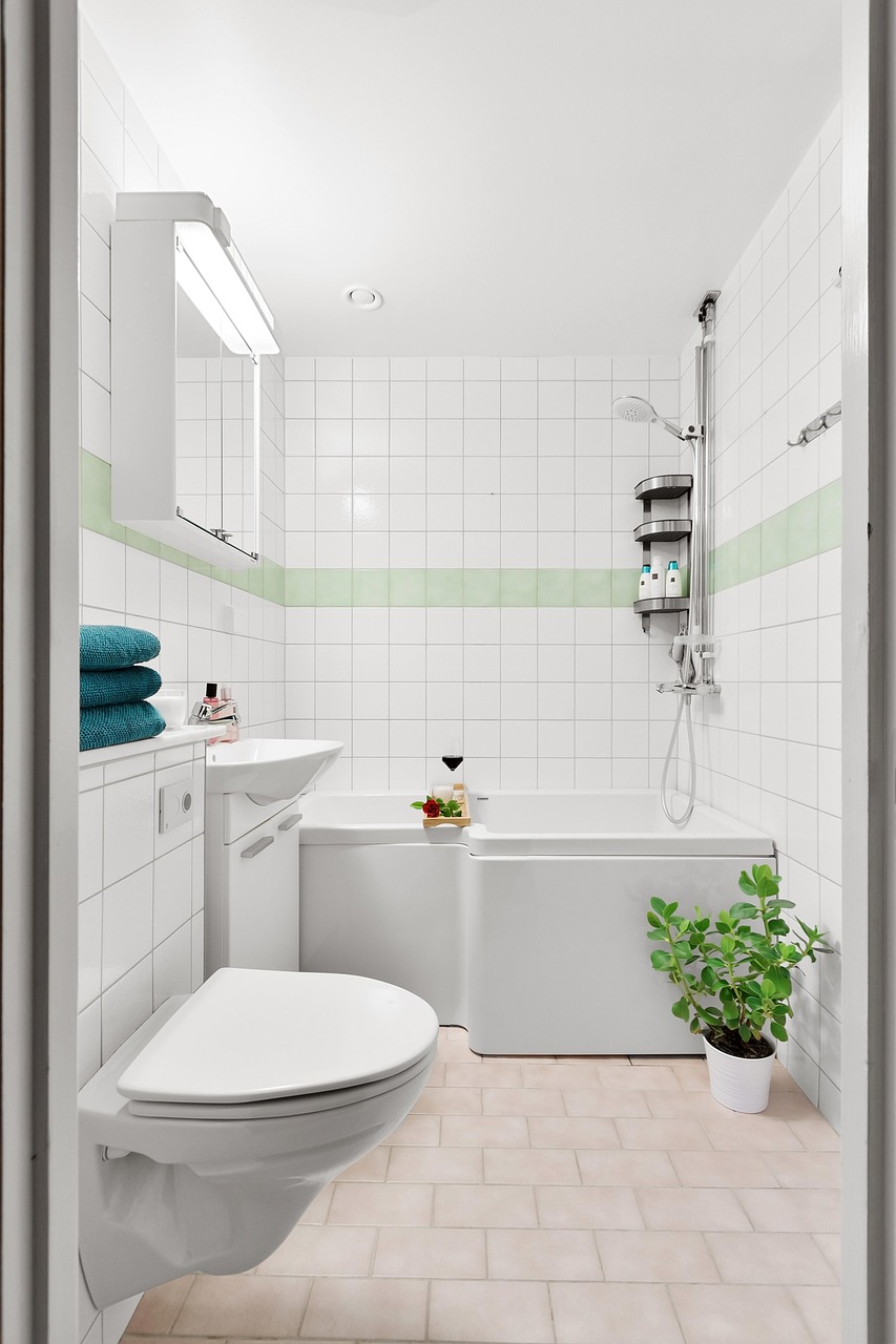 Bathroom with a warm wood vanity and matte black tapware and fittings