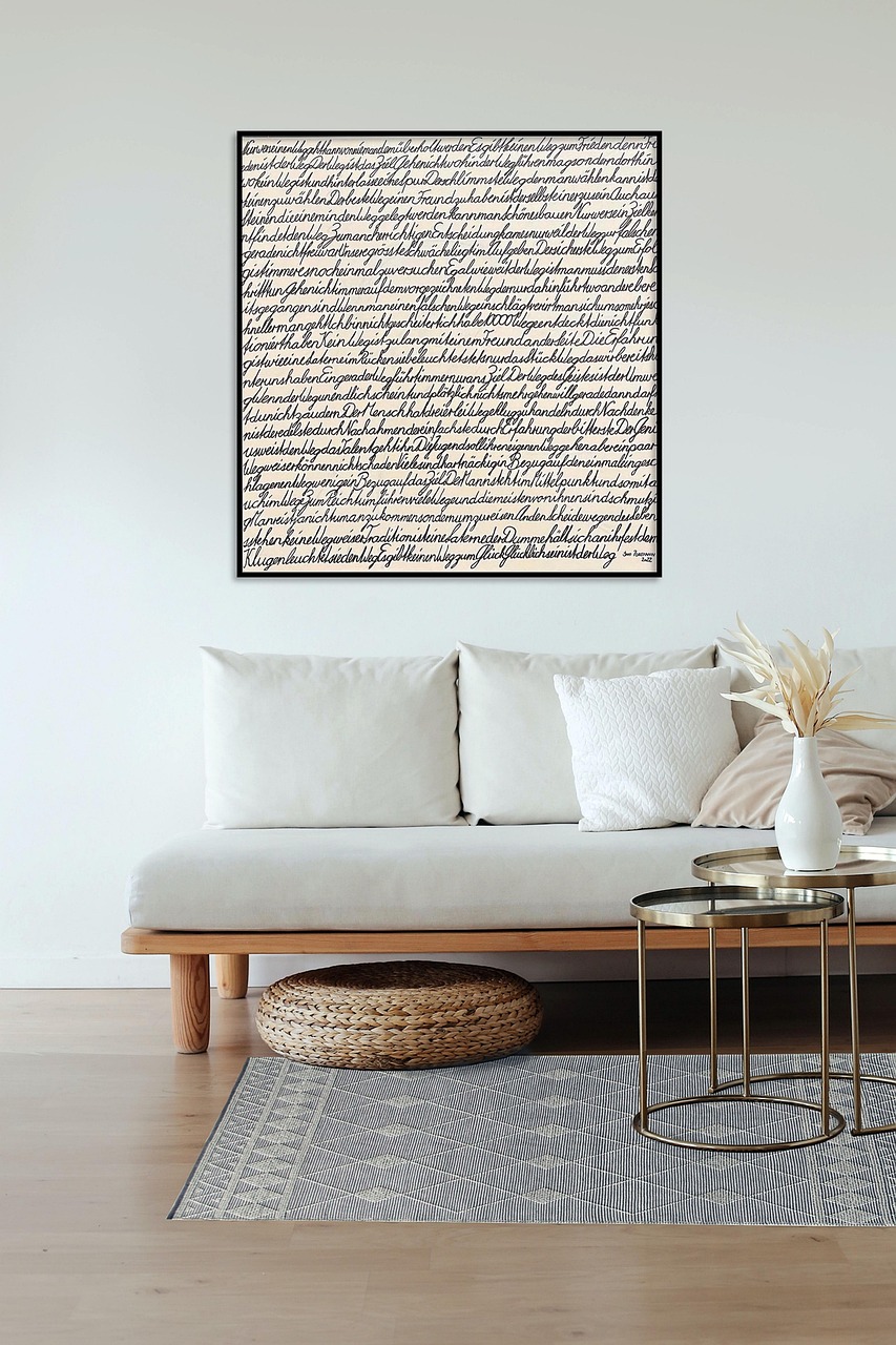 Neutral living room with a deep sectional sofa and soft throw blankets