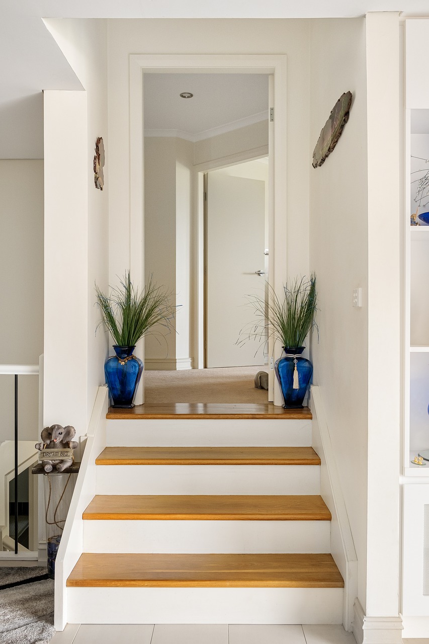 Bright entry area anchored by a statement pendant light fitting