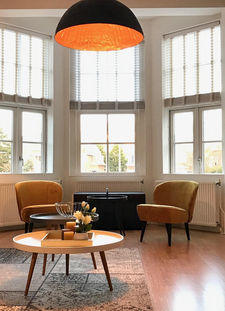 Butter yellow armchairs in a bright living room